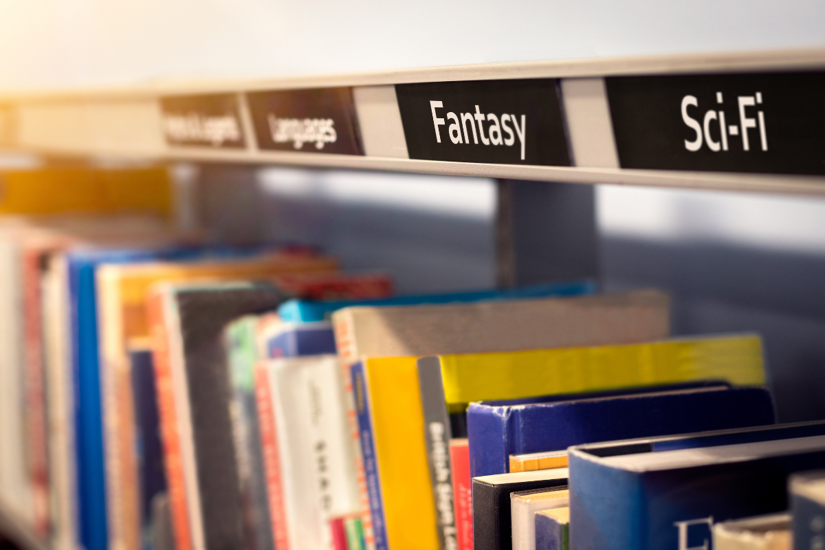 Library shelf featuring Fantasy and Sci-Fi sections,